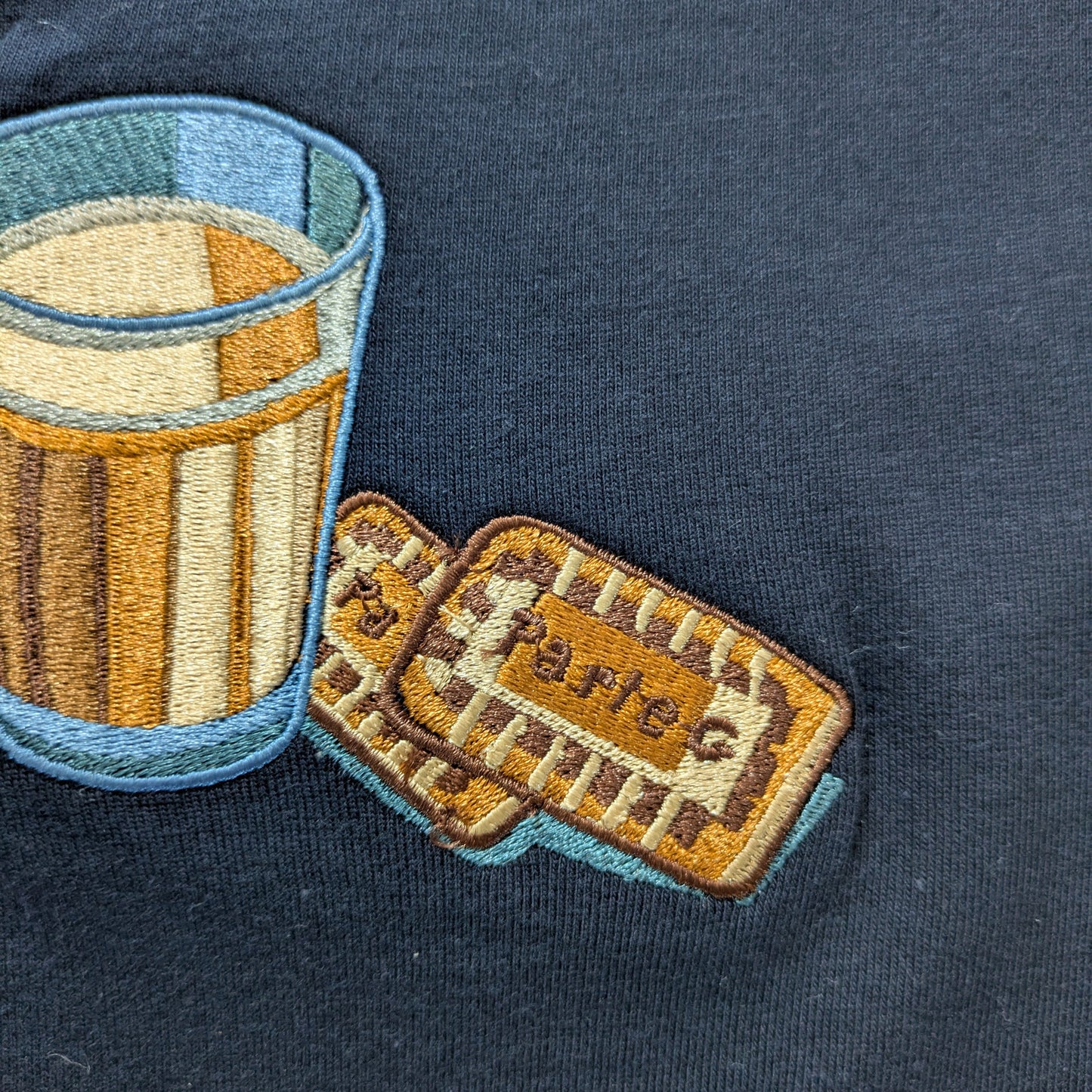 The Chai and Biscuit Embroidered Graphic Tee 100% Cotton
