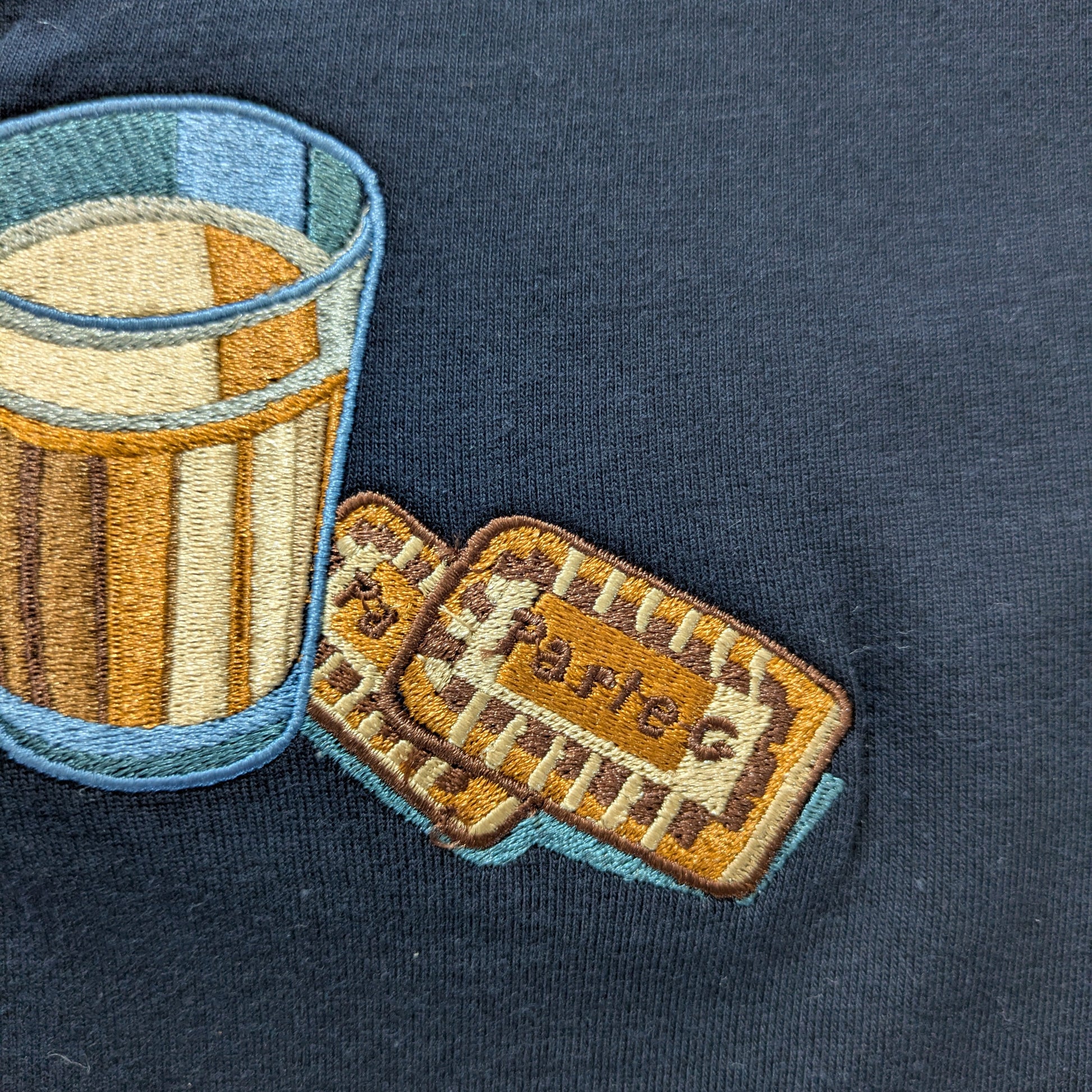 The Chai and Biscuit Embroidered Graphic Tee 100% Cotton