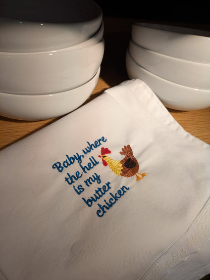 Baby tea towel from Bobbin Heads featuring humorous "Where the Hell Is My Butter Chicken" design, soft cotton fabric.