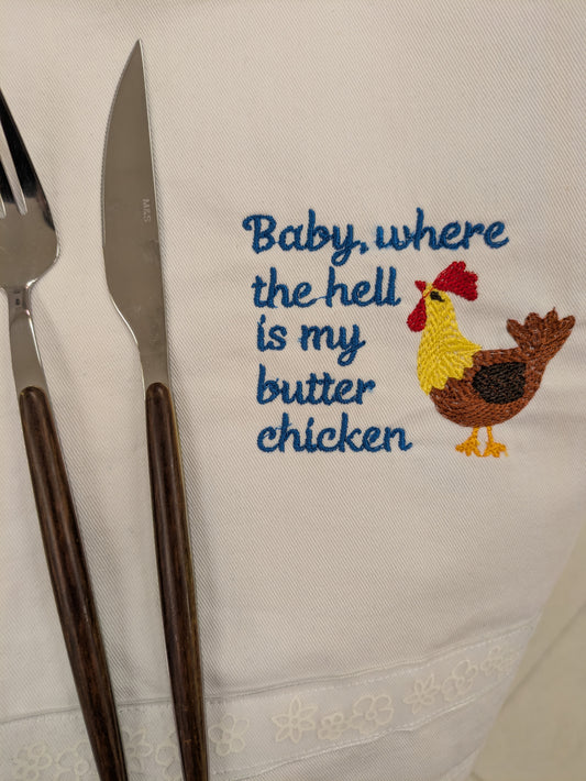 Baby butter chicken tea towel by Bobbin Heads featuring a humorous design, made of soft, absorbent fabric.